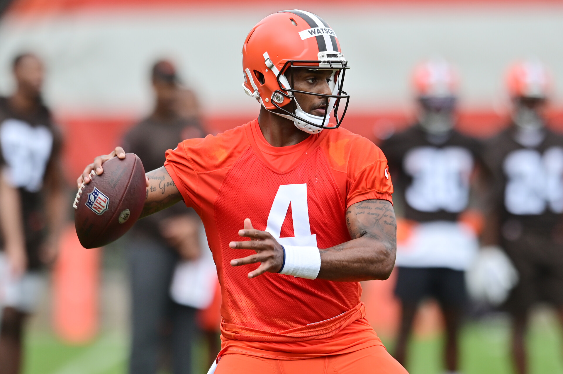 Cleveland Browns quarterback Deshaun Watson (4) throws a pass during organized team activities at CrossCountry Mortgage Campus.