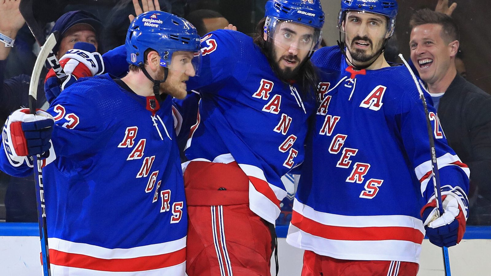New York Rangers center Mika Zibanejad (center) celebrates his goal against the Tampa Bay Lightning with left wing Chris Kreider (left) and defenseman Adam Fox (right) in the third period of Game 1 of the Eastern Conference Final of the 2022 Stanley Cup Playoffs