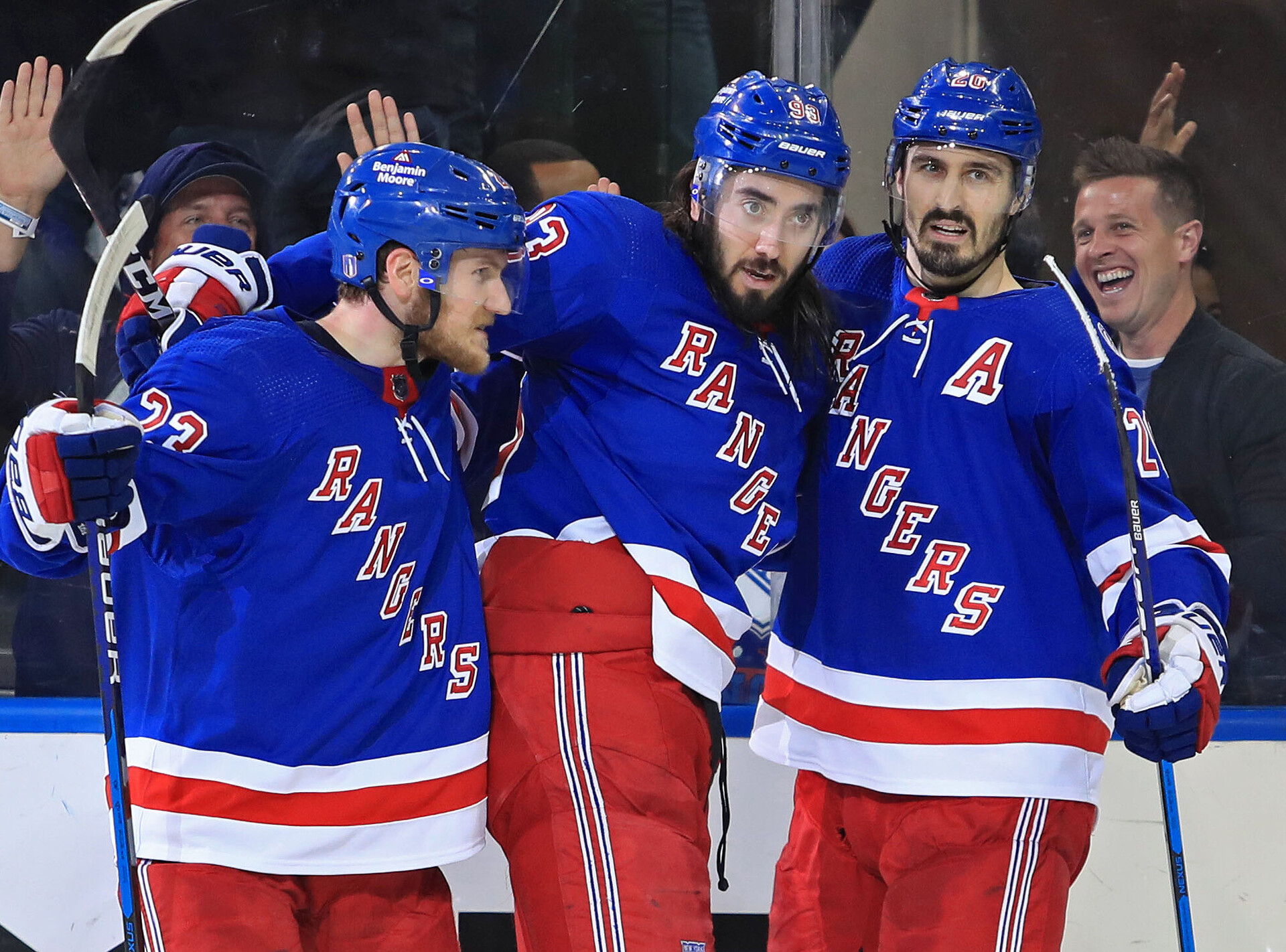 New York Rangers center Mika Zibanejad (center) celebrates his goal against the Tampa Bay Lightning with left wing Chris Kreider (left) and defenseman Adam Fox (right) in the third period of Game 1 of the Eastern Conference Final of the 2022 Stanley Cup Playoffs
