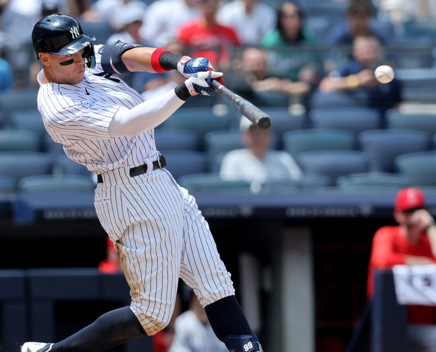 New York Yankees center fielder Aaron Judge connects with the baseball for a solo home run against the Los Angeles Angels