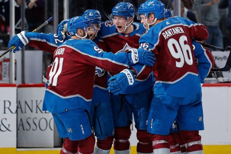 Colorado Avalanche defenseman Josh Manson (center) celebrates his goal with left wing Artturi Lehkonen (62) and right wing Mikko Rantanen (96) and center Nazem Kadri (91) in the second period against the Edmonton Oilers in Game 2 of the Western Conference Final of the 2022 Stanley Cup Playoffs