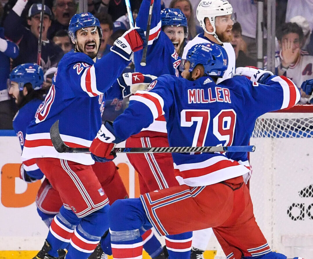 New York Rangers defenseman K'Andre Miller, front, celebrates his goal against the Tampa Bay Lightning during the first period in game two of the Eastern Conference Final of the 2022 Stanley Cup Playoffs at Madison Square Garden on June 3, 2022.