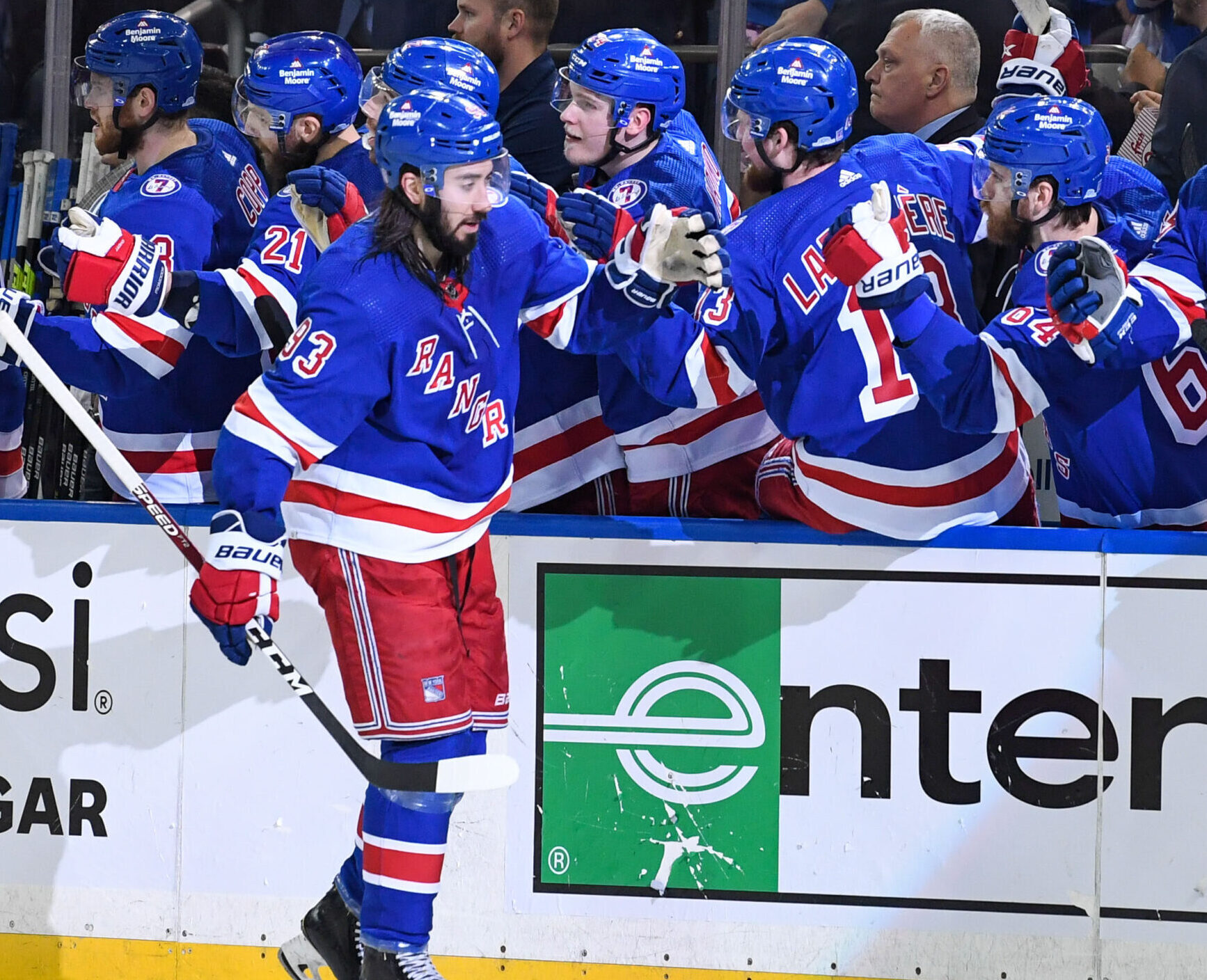 New York Rangers center Mika Zibanejad (93) high-fives teammates on the bench after his goal against the Tampa Bay Lightning during Game 2 of the Eastern Conference Finals of the 2022 Stanley Cup Playoffs