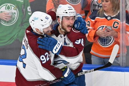Colorado Avalanche teammates Mikko Rantanen, right, and Gabriel Landeskog, left, celebrate a win against the Edmonton Oilers in game three of the Western Conference Final of the 2022 Stanley Cup Playoffs at Rogers Place on June 4, 2022.