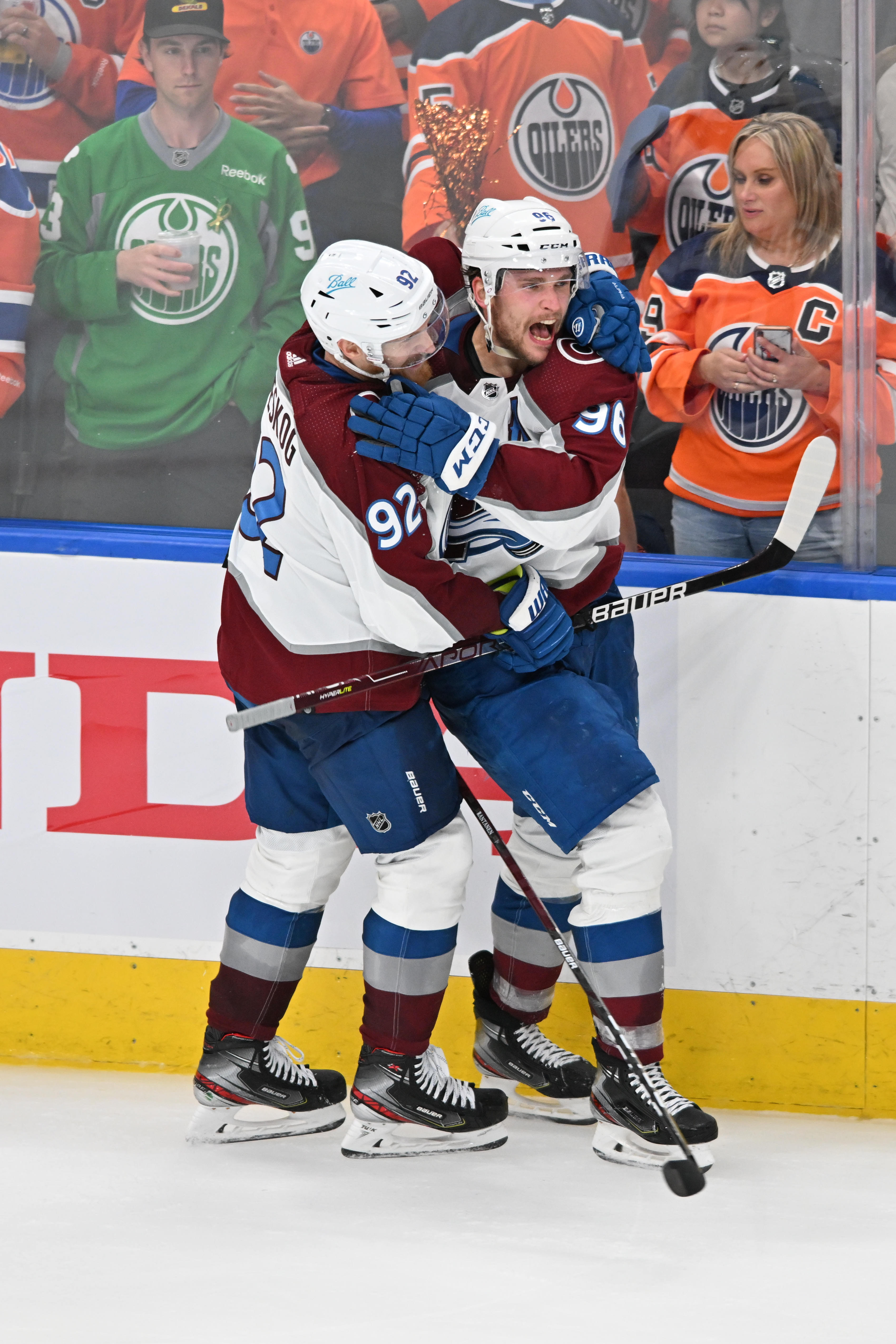 Colorado Avalanche teammates Mikko Rantanen, right, and Gabriel Landeskog, left, celebrate a win against the Edmonton Oilers in game three of the Western Conference Final of the 2022 Stanley Cup Playoffs at Rogers Place on June 4, 2022.