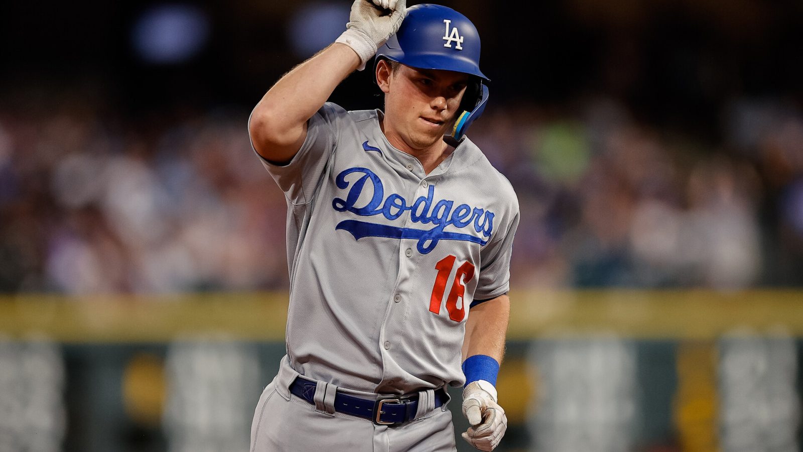 Los Angeles Dodgers catcher Will Smith (16) gestures as he/vcx rounds the bases on a two run home run in the fifth inning against the Colorado Rockies at Coors Field.