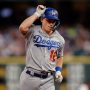 Los Angeles Dodgers catcher Will Smith (16) gestures as he/vcx rounds the bases on a two run home run in the fifth inning against the Colorado Rockies at Coors Field.