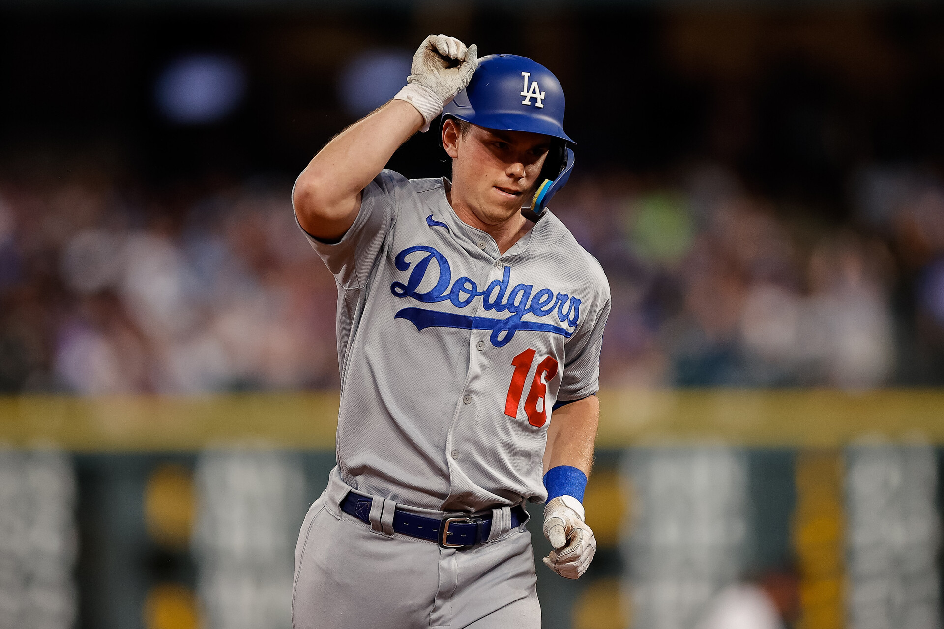 Los Angeles Dodgers catcher Will Smith (16) gestures as he/vcx rounds the bases on a two run home run in the fifth inning against the Colorado Rockies at Coors Field.