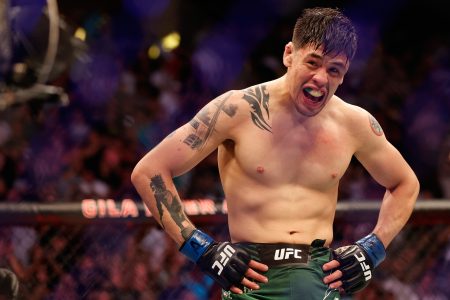 Brandon Moreno of Mexico celebrates after defeating Deiveson Figueiredo of Brazil to win the flyweight championship during their UFC 263 match at Gila River Arena on June 12, 2021 in Glendale, Arizona.