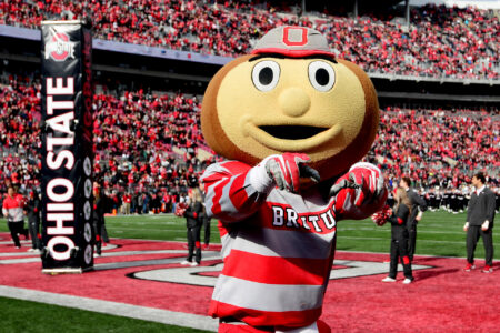 Brutus the Ohio State Buckeye runs on the field before a game against the Michigan State Spartans at Ohio Stadium on November 20, 2021 in Columbus, Ohio.