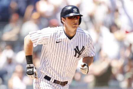 DJ LeMahieu #26 of the New York Yankees jogs to first after drawing a walk with the bases loaded during the seventh inning against the Detroit Tigers at Yankee Stadium on June 05, 2022 in the Bronx borough of New York City.