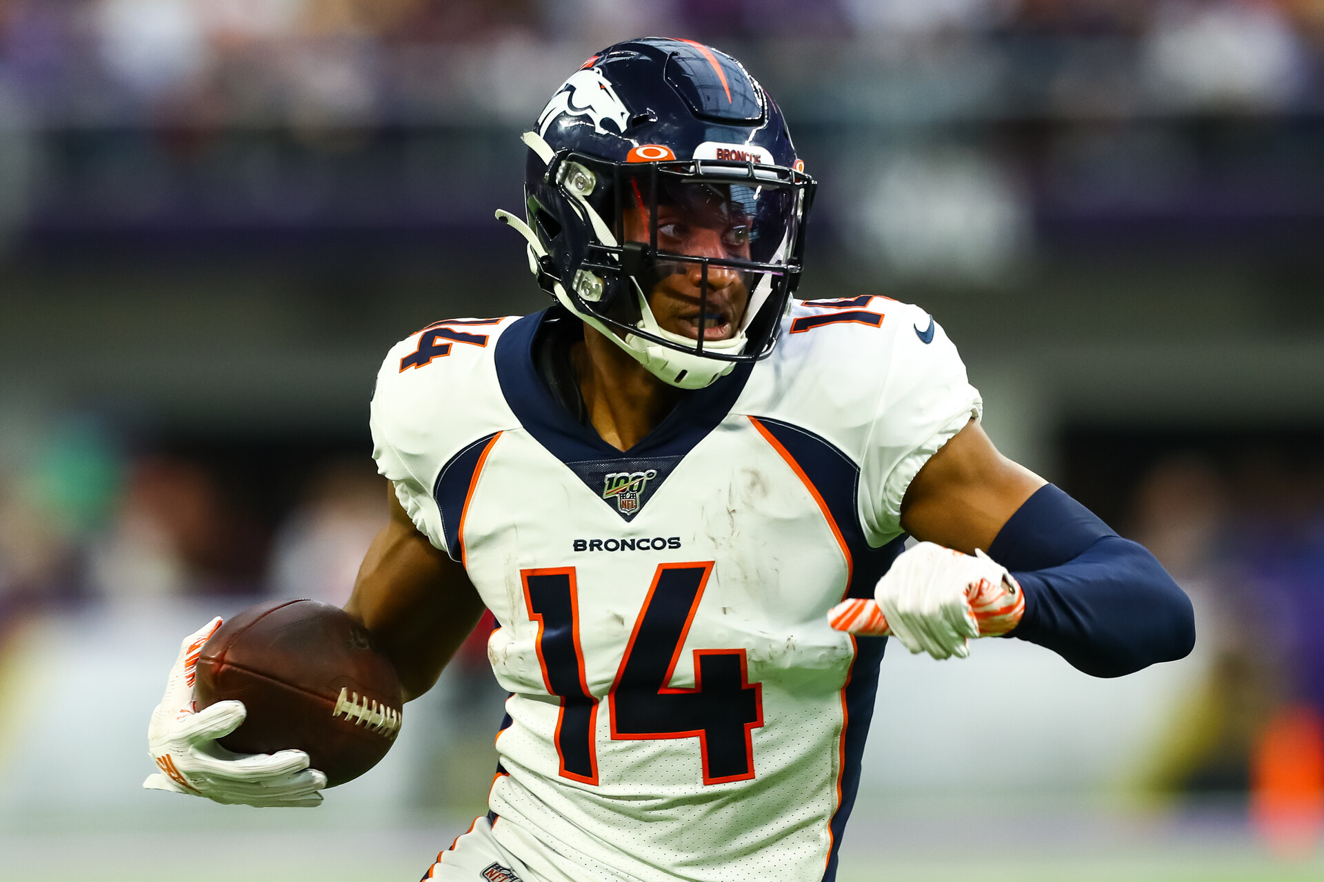 Denver Broncos wide receiver Courtland Sutton (14) runs with the ball in the first quarter against the Minnesota Vikings at U.S. Bank Stadium.