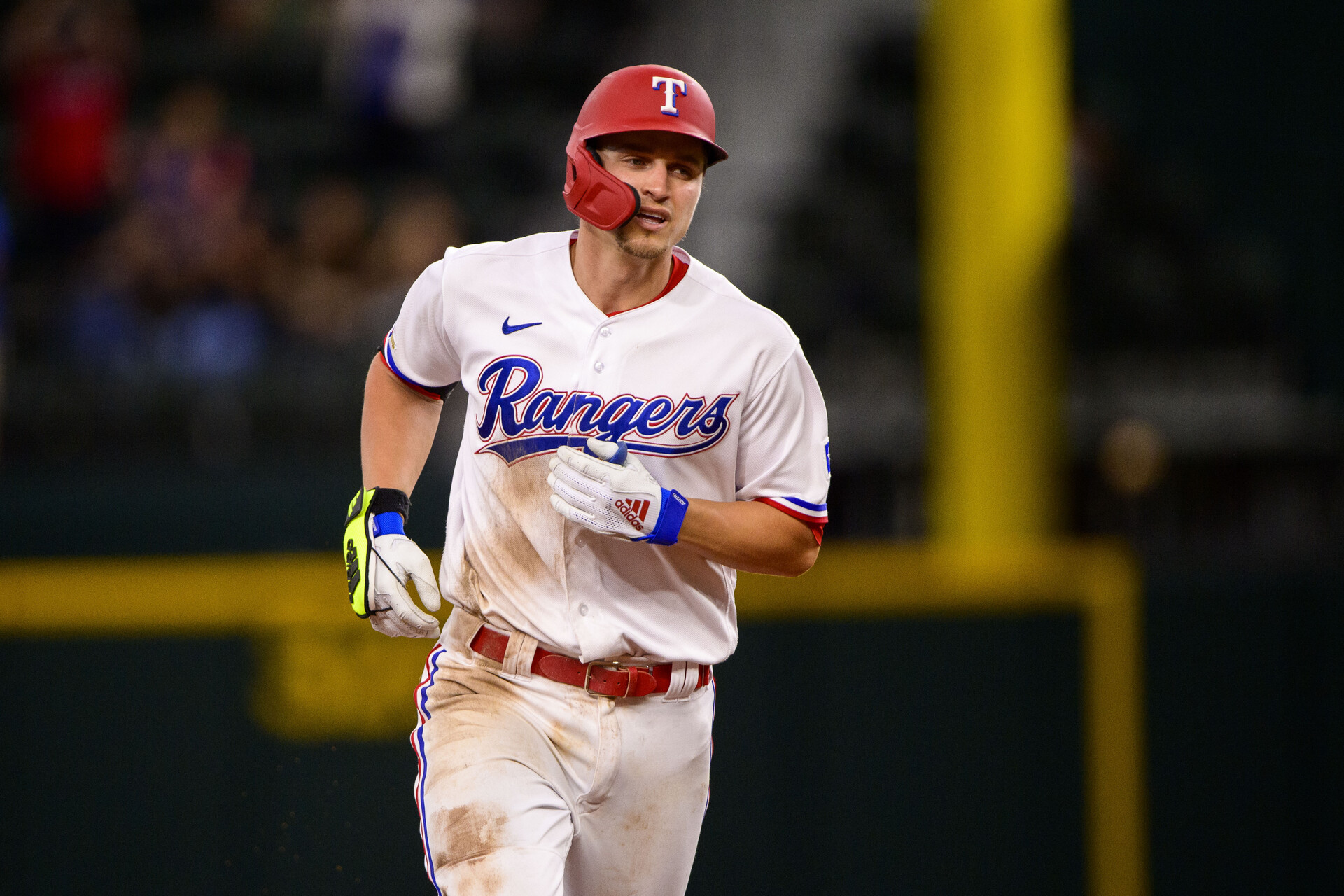 Texas Rangers shortstop Corey Seager (5) rounds the bases after hitting a home run against the Houston Astros during the ninth inning at Globe Life Field.
