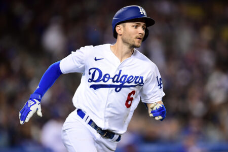 Los Angeles Dodgers shortstop Trea Turner (6) reaches first on a double hit against the San Francisco Giants during the sixth inning at Dodger Stadium.