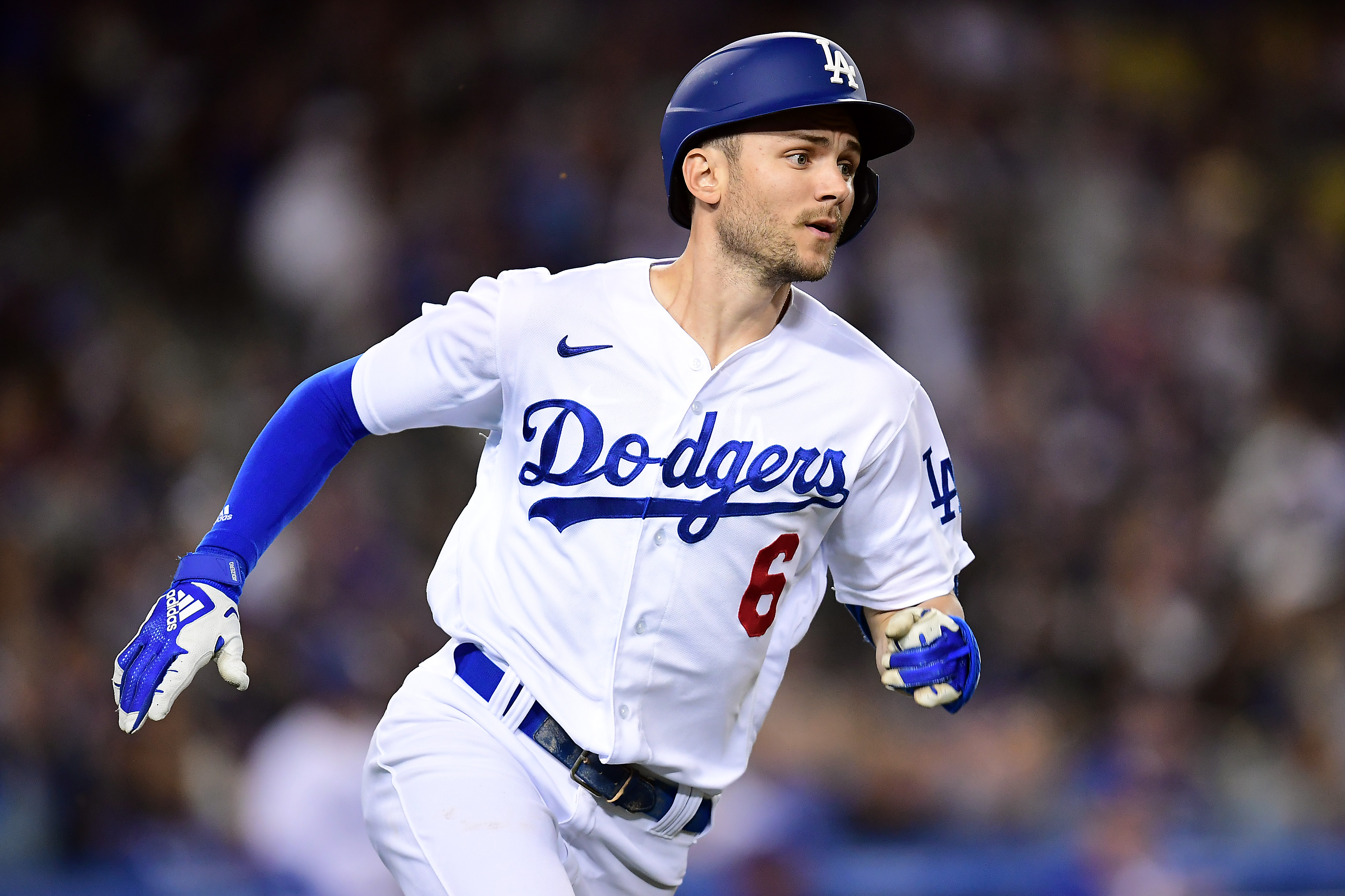 Los Angeles Dodgers shortstop Trea Turner (6) reaches first on a double hit against the San Francisco Giants during the sixth inning at Dodger Stadium.