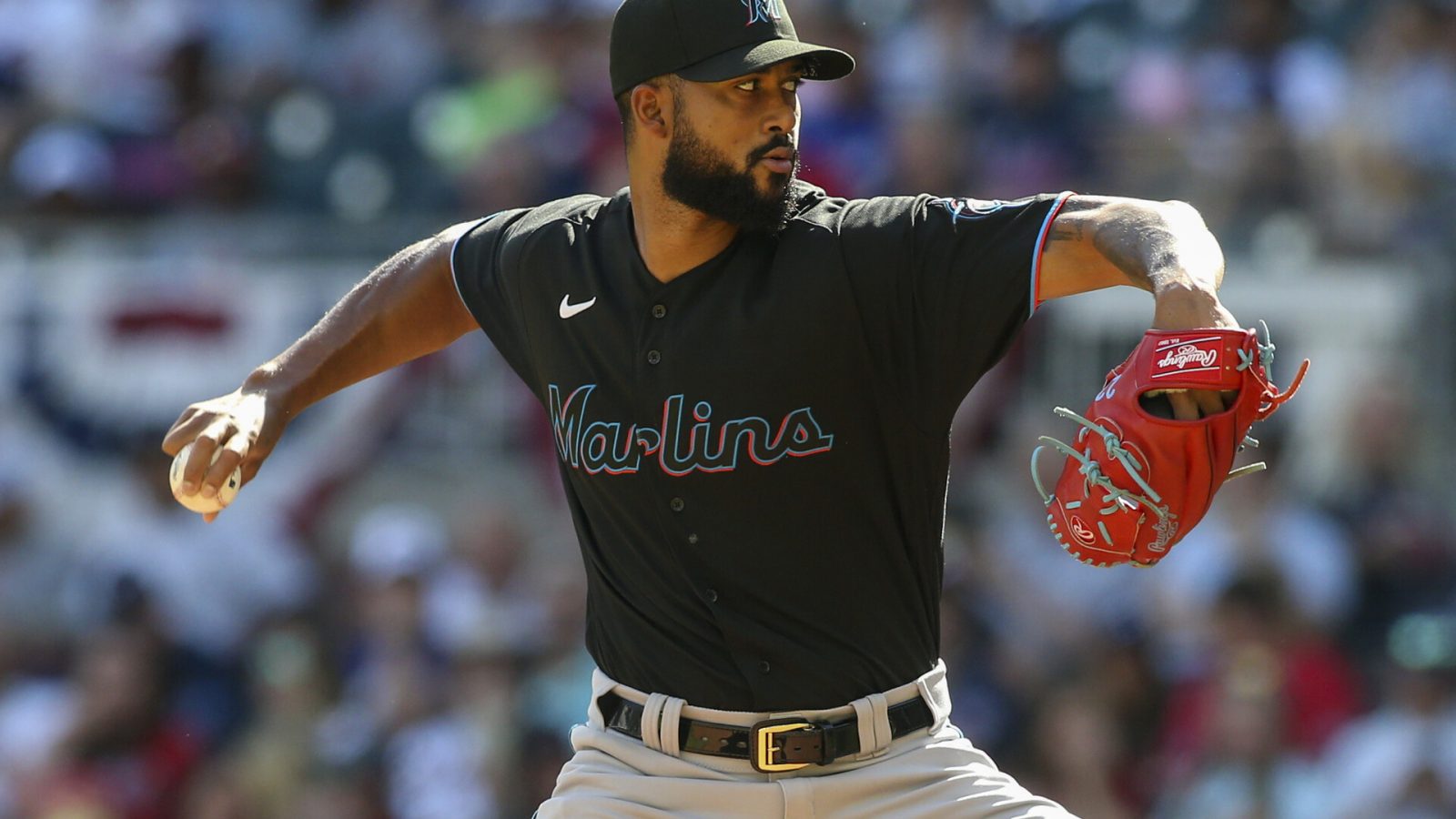 Miami Marlins starting pitcher Sandy Alcantara (22) throws against the Atlanta Braves in the fourth inning at Truist Park.