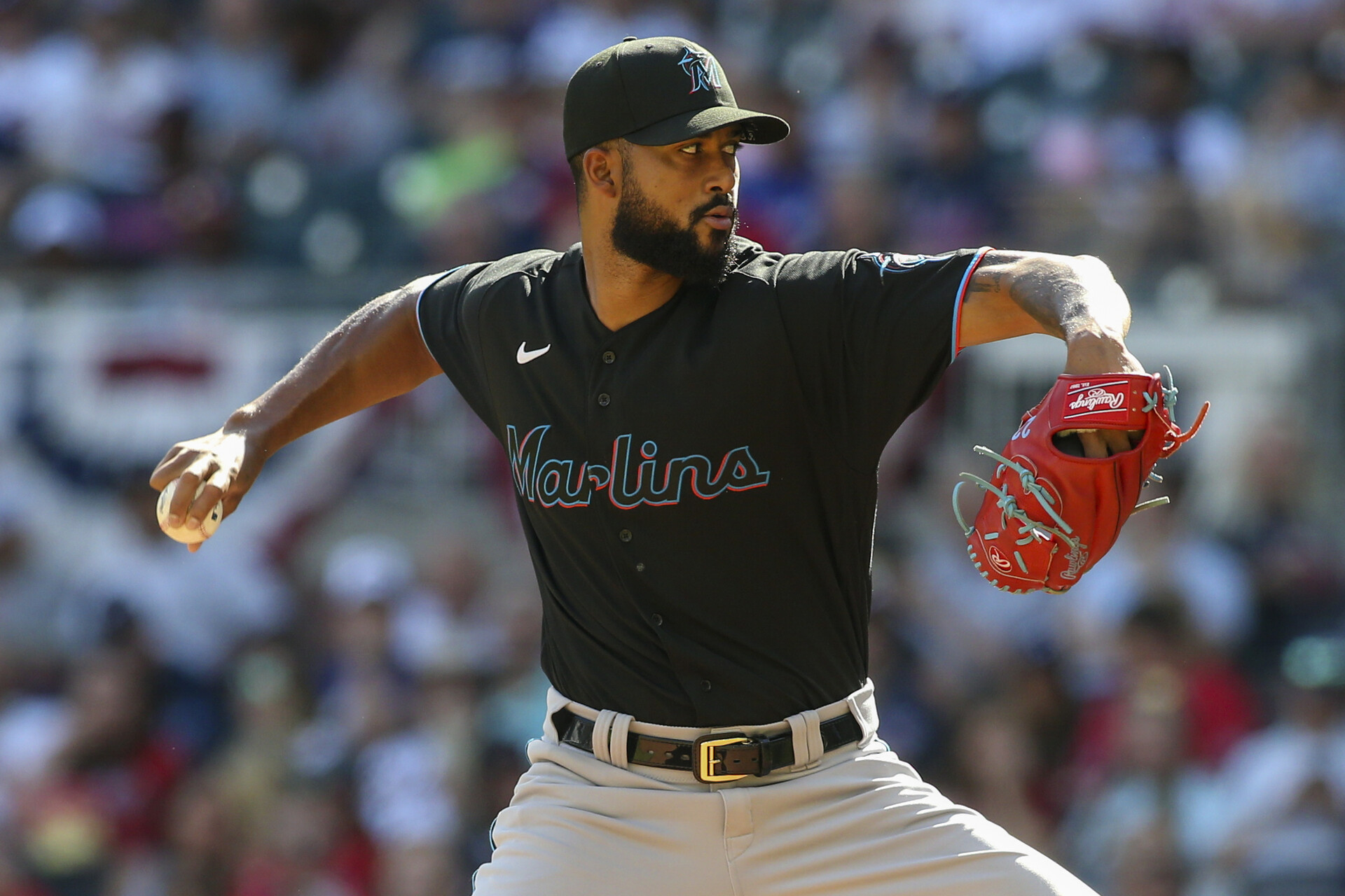 Miami Marlins starting pitcher Sandy Alcantara (22) throws against the Atlanta Braves in the fourth inning at Truist Park.