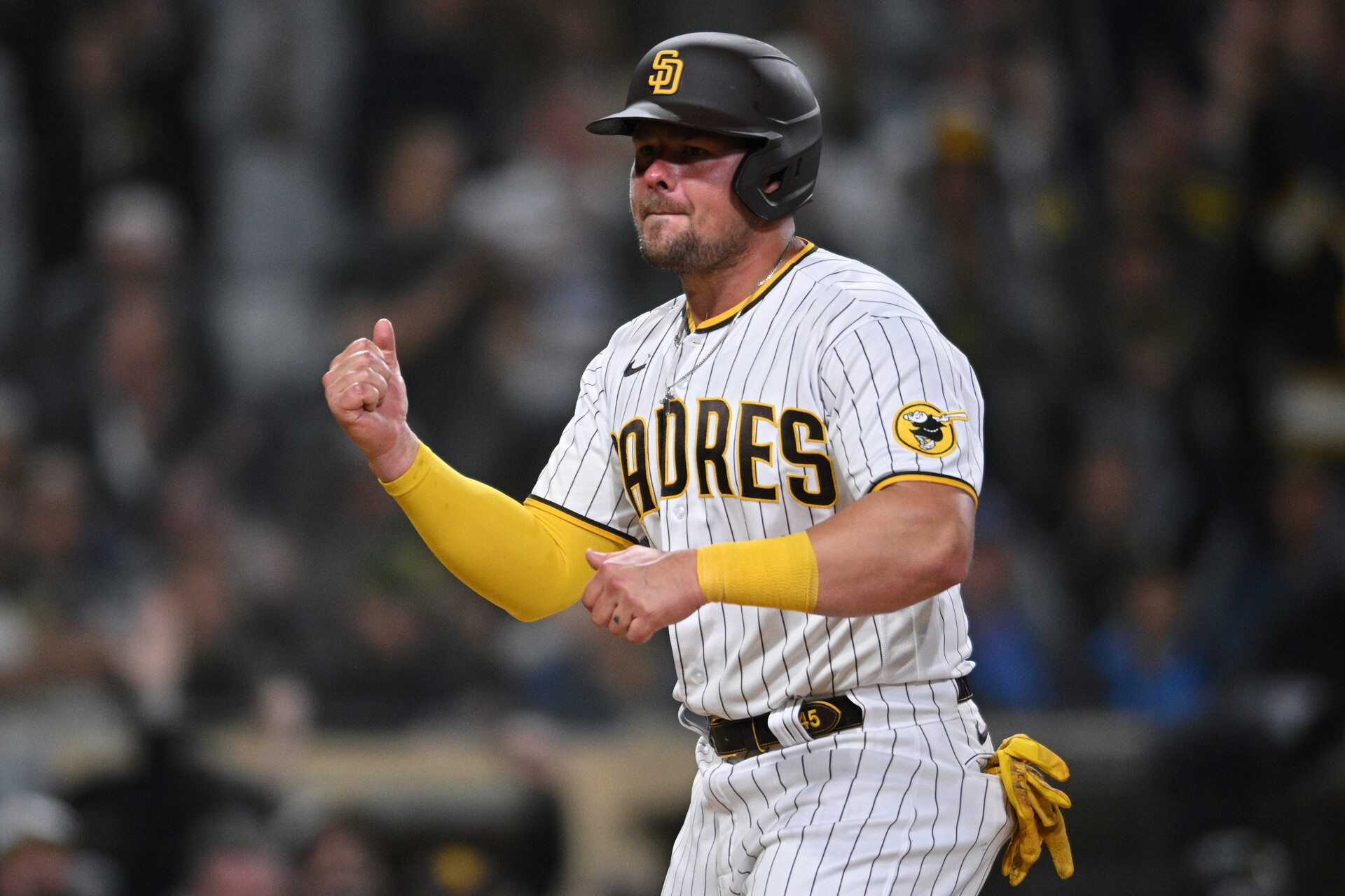 San Diego Padres designated hitter Luke Voit (45) reacts after scoring a run on a single hit by center fielder Trent Grisham (not pictured) during the seventh inning against the Pittsburgh Pirates at Petco Park.