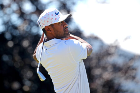 Tony Finau plays his shot from the 16th tee