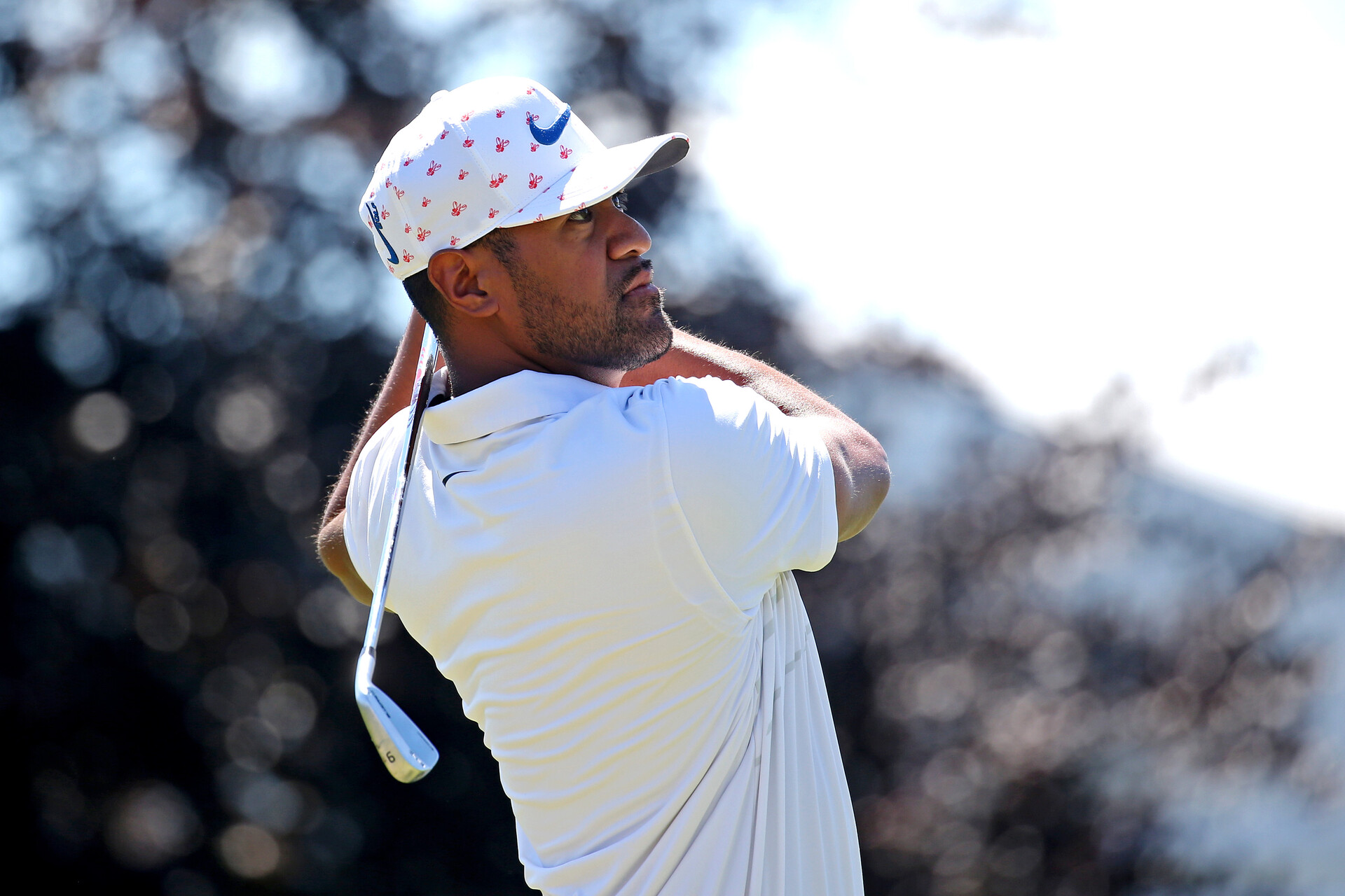 Tony Finau plays his shot from the 16th tee