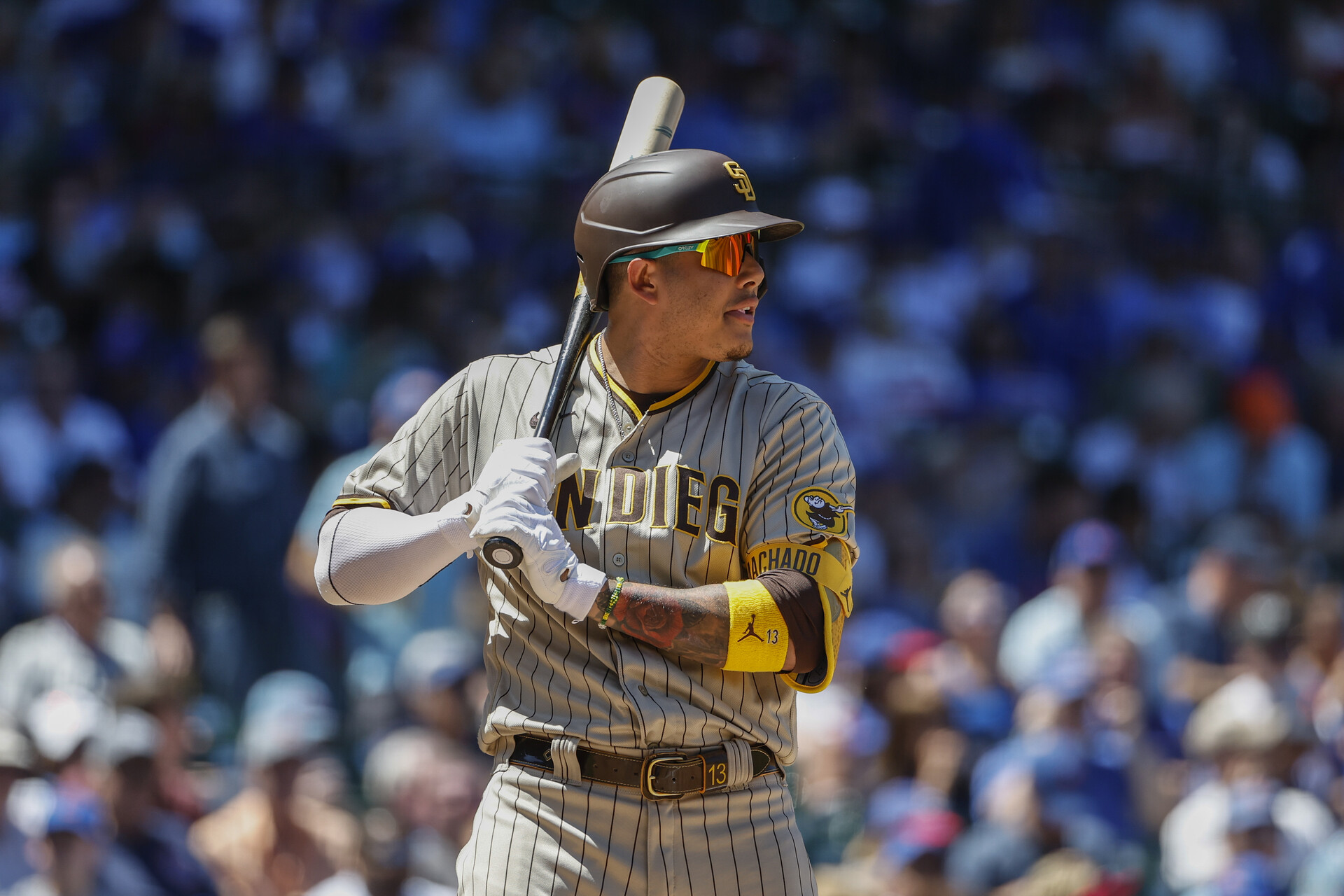 San Diego Padres third baseman Manny Machado (13) bats against the Chicago Cubs during the second inning at Wrigley Field.