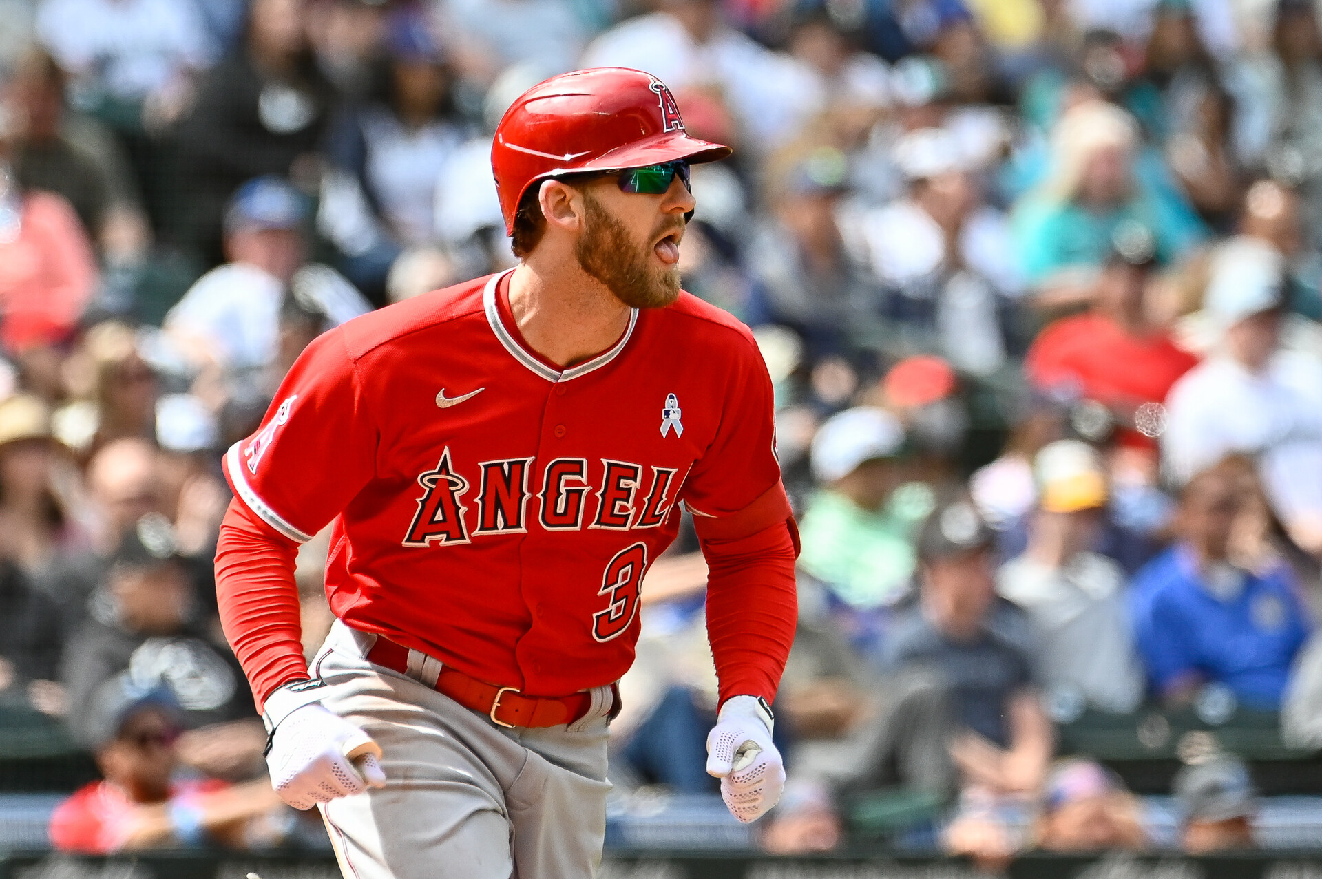 Los Angeles Angels right fielder Taylor Ward (3) runs towards first base after hitting a single against the Seattle Mariners during the eighth inning at T-Mobile Park.