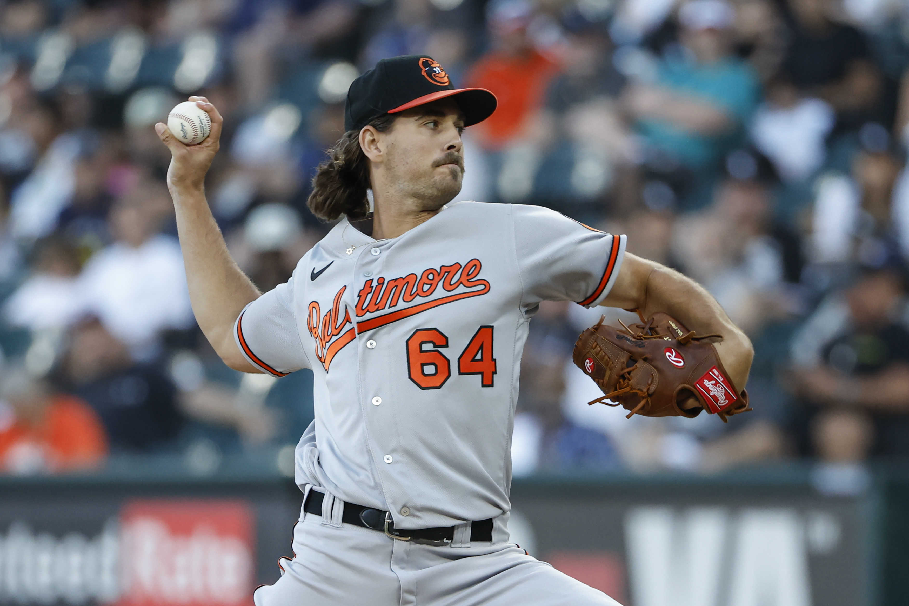 Baltimore Orioles starting pitcher Dean Kremer (64) delivers against the Chicago White Sox during the first inning at Guaranteed Rate Field.