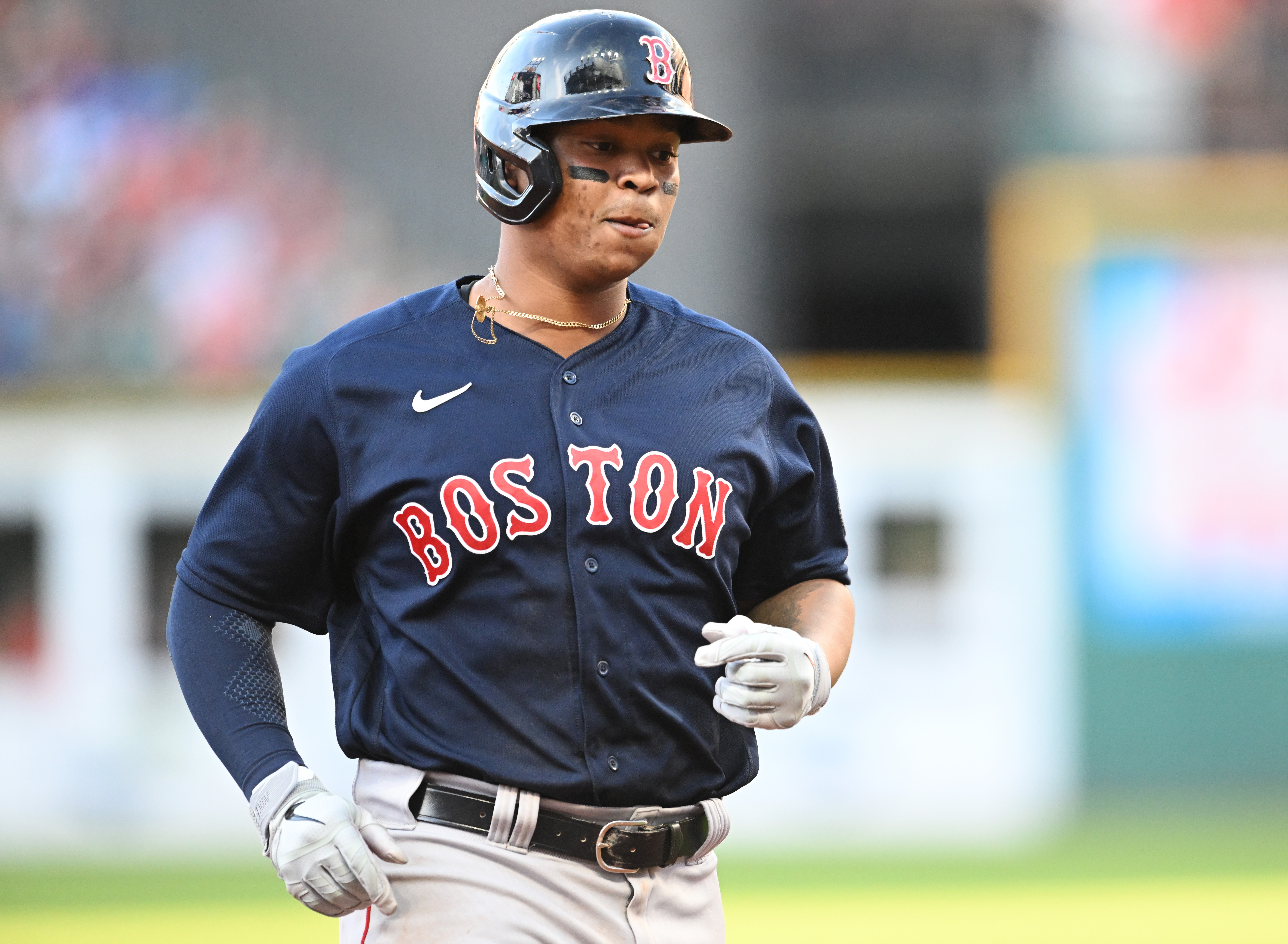 Boston Red Sox third baseman Rafael Devers (11) rounds the bases after hitting a home run during the third inning against the Cleveland Guardians at Progressive Field.