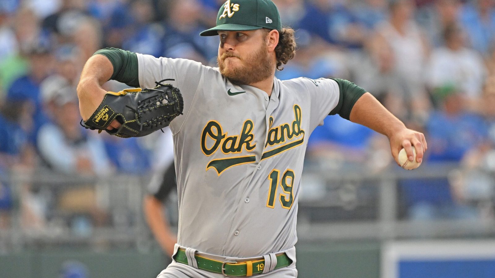 Oakland Athletics starting pitcher Cole Irvin (19) delivers a pitch during the first inning against the Kansas City Royals at Kauffman Stadium.