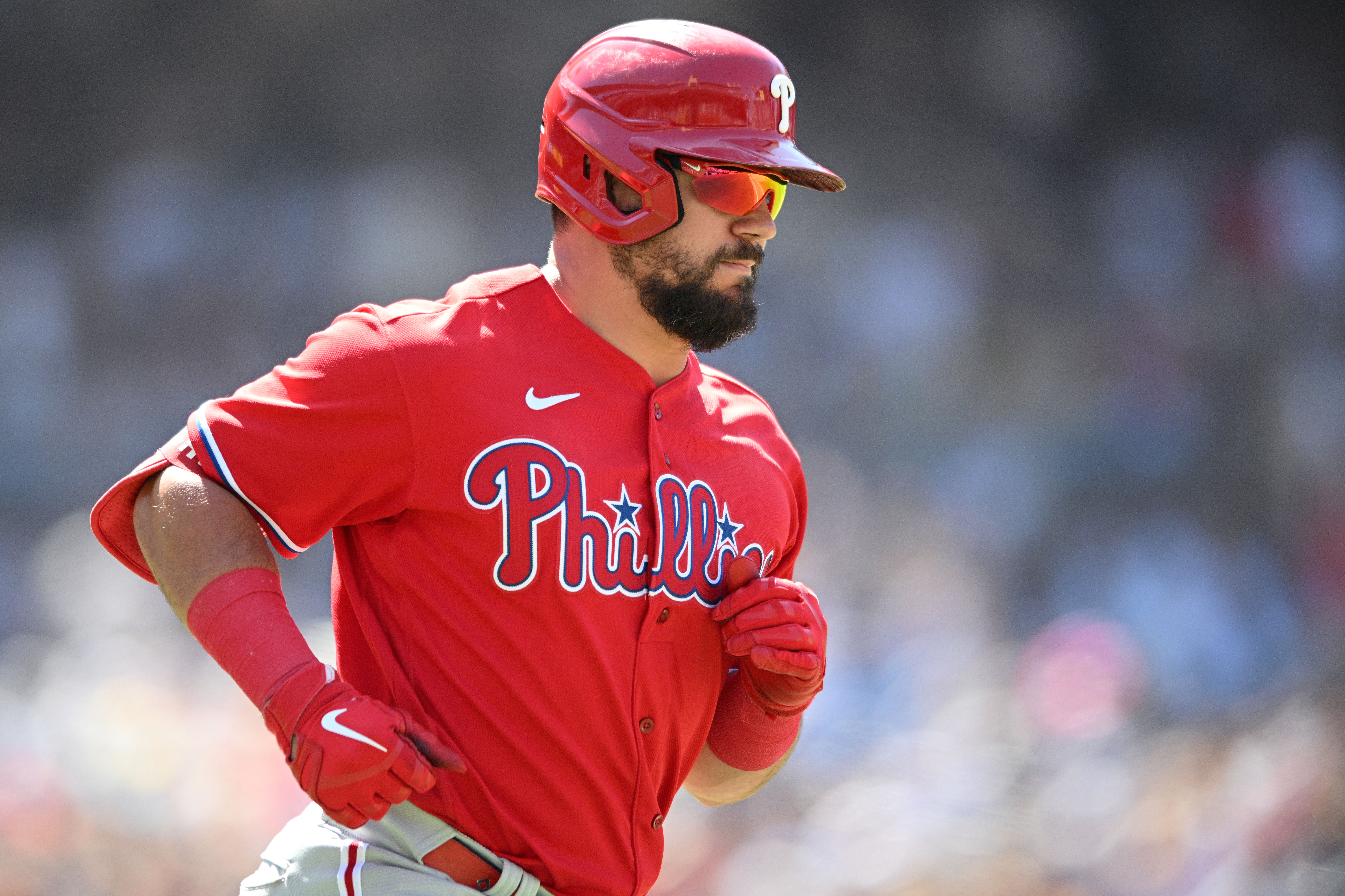 Philadelphia Phillies left fielder Kyle Schwarber (12) rounds the bases after hitting a three-run home run during the seventh inning against the San Diego Padres at Petco Park.
