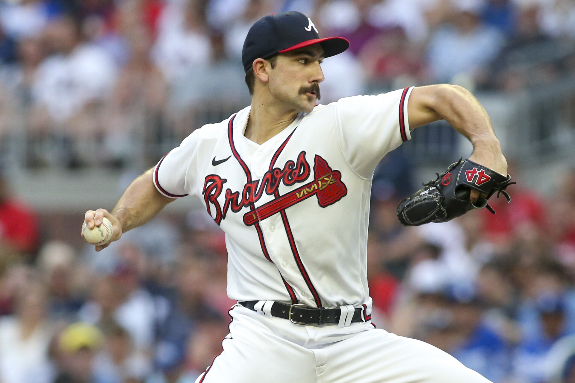 Atlanta Braves starting pitcher Spencer Strider (65) throws against the Los Angeles Dodgers in the second inning at Truist Park.