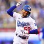 Los Angeles, California, USA; Los Angeles Dodgers right fielder Mookie Betts (50) runs the bases after hitting a solo home run against the Chicago Cubs during the first inning at Dodger Stadium.