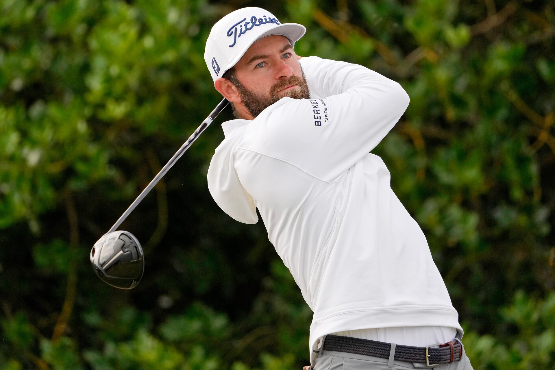 Cameron Young tees off on the third hole during the first round of the 150th Open Championship golf tournament at St. Andrews Old Course.