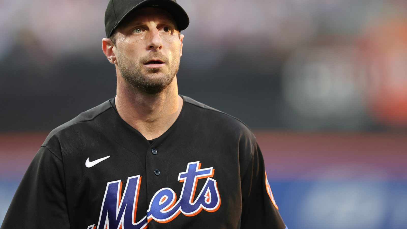 New York Mets starting pitcher Max Scherzer (21) walks off the field after the top of the first inning against the San Diego Padres at Citi Field.