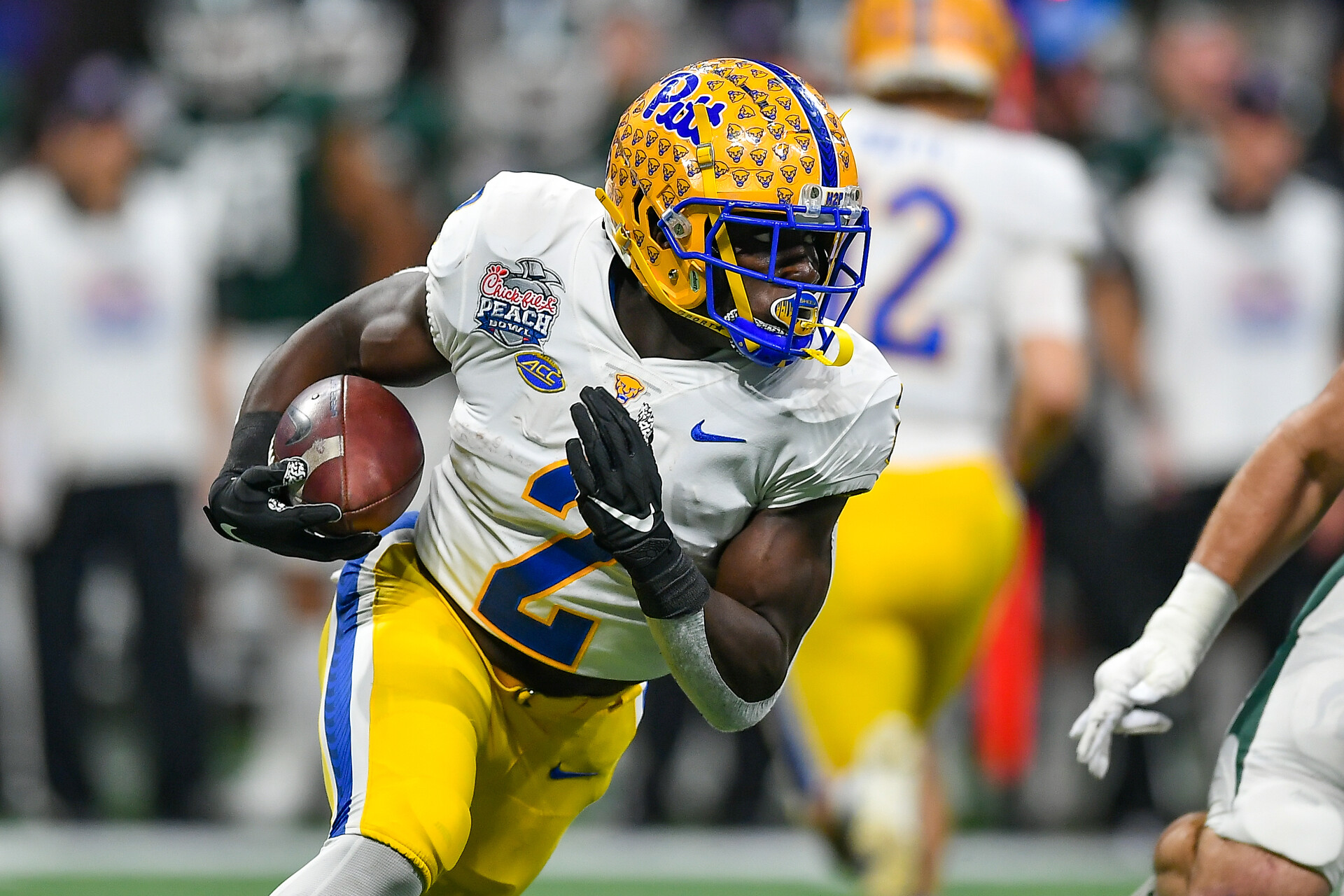 Pittsburgh running back Israel Abanikanda (2) runs the ball during the Chick-fil-A Peach Bowl between the Michigan State Spartans and Pittsburgh Panthers on December 30th, 2021 at Mercedes Benz Stadium in Atlanta, GA.