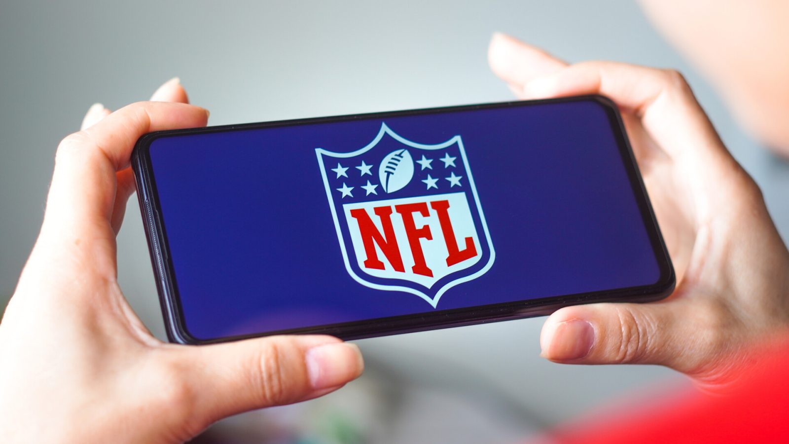 BRAZIL - 2022/07/29: In this photo illustration, the National Football League (NFL) logo is displayed on a smartphone screen.