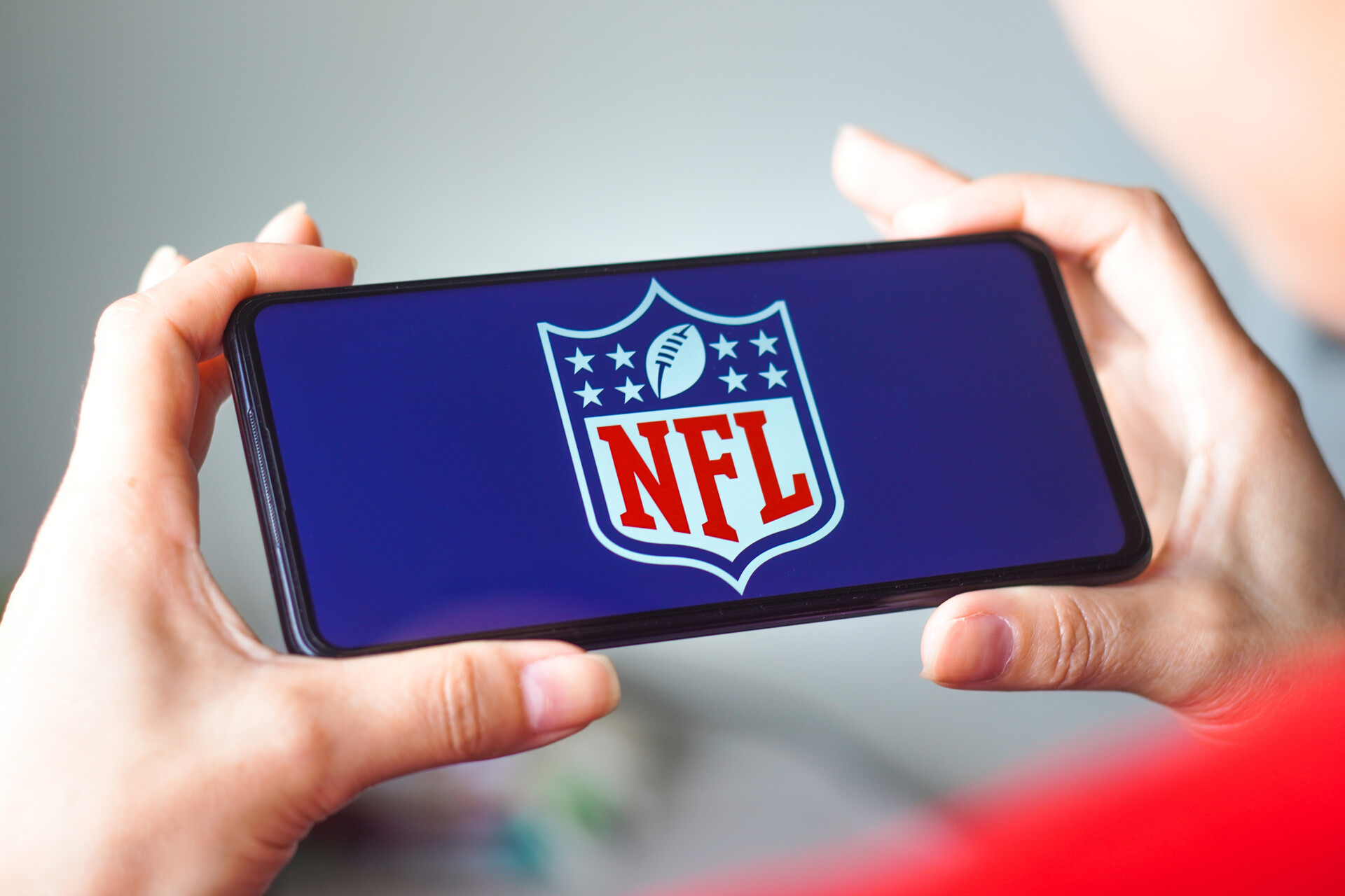 BRAZIL - 2022/07/29: In this photo illustration, the National Football League (NFL) logo is displayed on a smartphone screen.