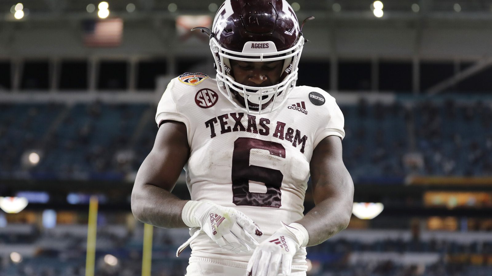 Devon Achane #6 of the Texas A&M Aggies celebrates after scoring a 76-yard touchdown run against the North Carolina Tar Heels during the second half of the Capital One Orange Bowl at Hard Rock Stadium on January 02, 2021 in Miami Gardens, Florida.