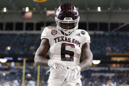 Devon Achane #6 of the Texas A&M Aggies celebrates after scoring a 76-yard touchdown run against the North Carolina Tar Heels during the second half of the Capital One Orange Bowl at Hard Rock Stadium on January 02, 2021 in Miami Gardens, Florida.