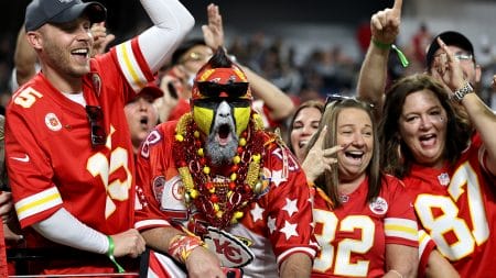 Kansas City Chiefs fans react before the game between the Kansas City Chiefs and Las Vegas Raiders at Allegiant Stadium on November 14, 2021 in Las Vegas, Nevada.