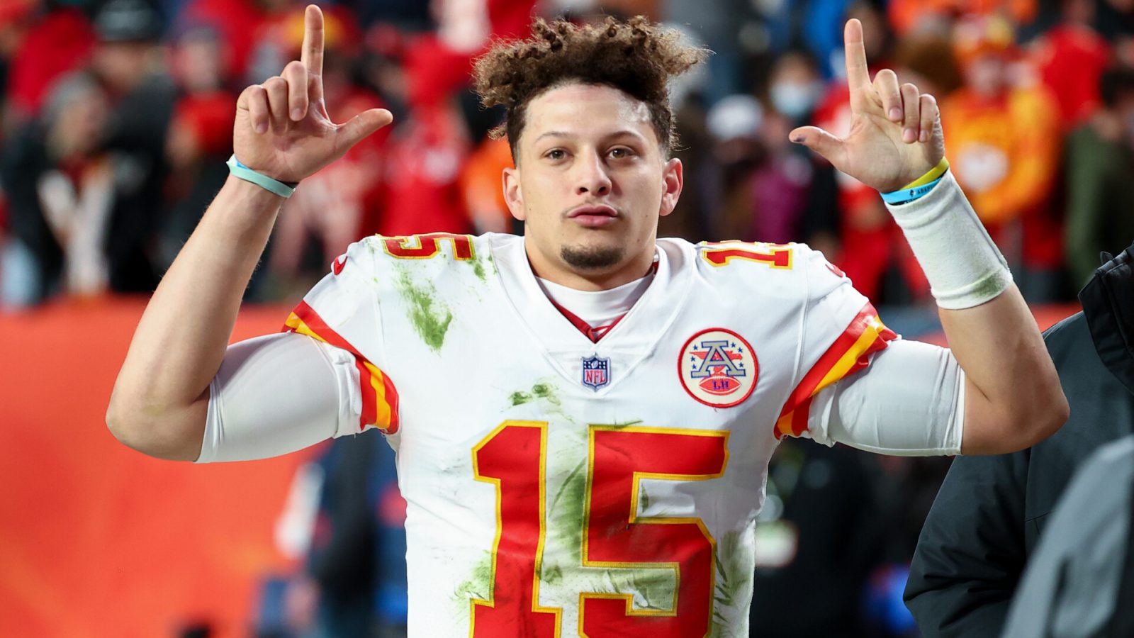 Patrick Mahomes #15 of the Kansas City Chiefs leaves the field after defeating the Denver Broncos 28-24 at Empower Field At Mile High on January 08, 2022 in Denver, Colorado.