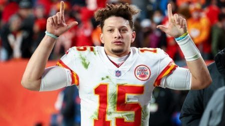 Patrick Mahomes #15 of the Kansas City Chiefs leaves the field after defeating the Denver Broncos 28-24 at Empower Field At Mile High on January 08, 2022 in Denver, Colorado.