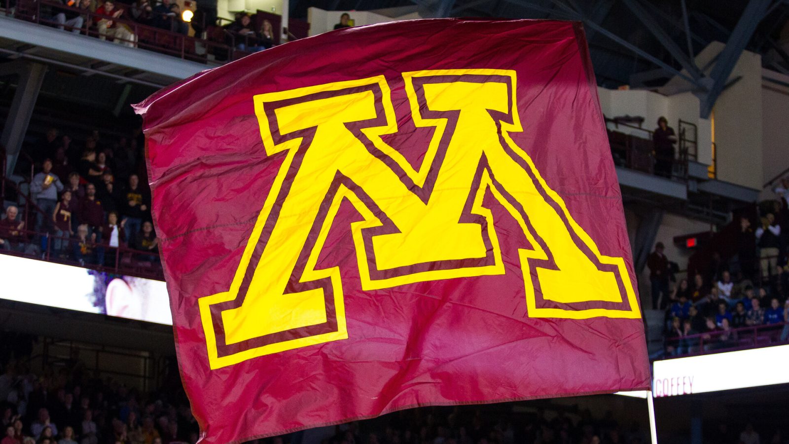 A Minnesota Golden Gophers flag waves during the lineup announcements during the Big Ten Conference match up between the Michigan State Spartans and the Minnesota Golden Gophers on December 27, 2016 at Williams Arena in Minneapolis, Minnesota.