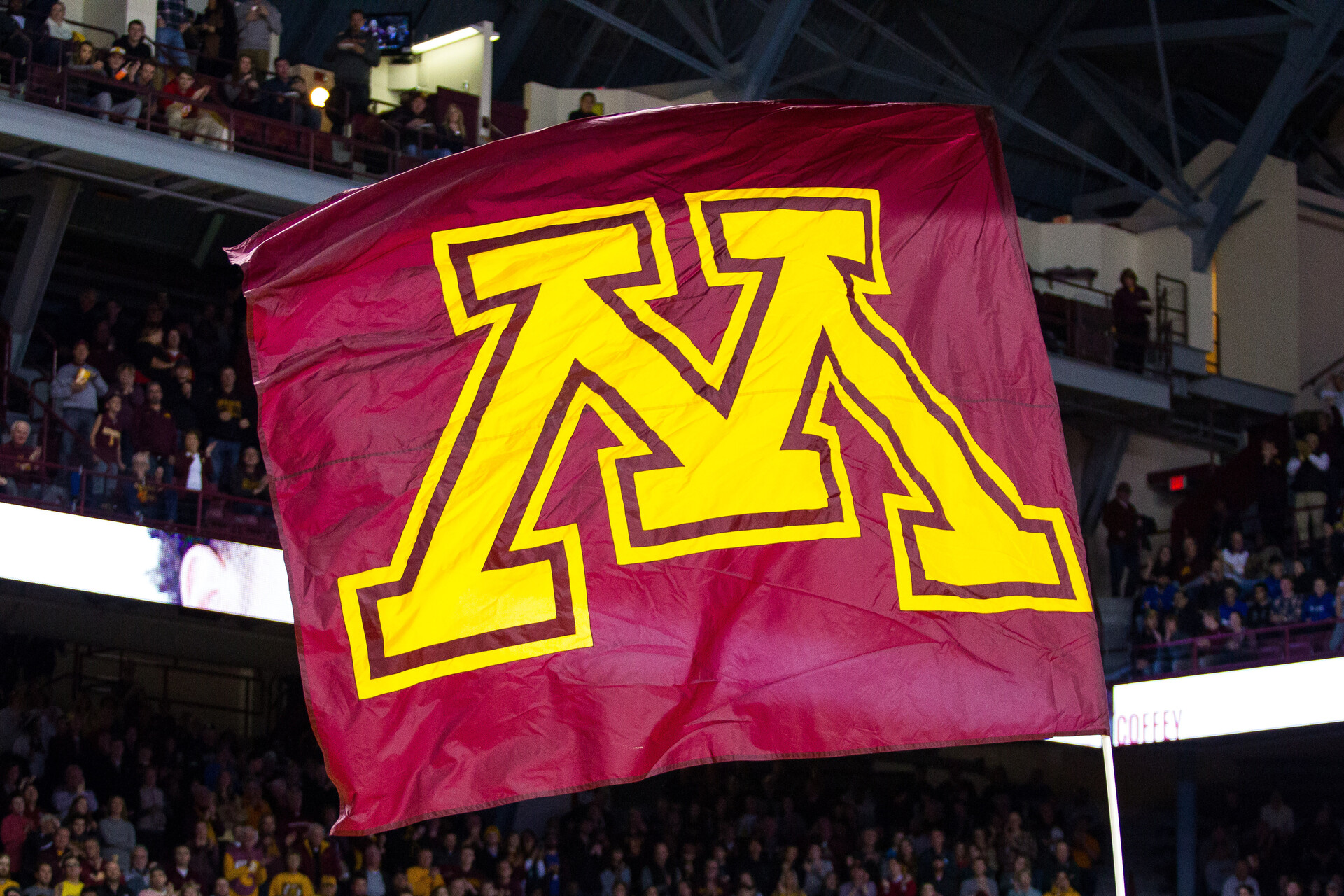 A Minnesota Golden Gophers flag waves during the lineup announcements during the Big Ten Conference match up between the Michigan State Spartans and the Minnesota Golden Gophers on December 27, 2016 at Williams Arena in Minneapolis, Minnesota.