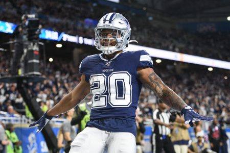 Dallas Cowboys running back Tony Pollard (20) celebrates his touchdown during the first quarter against the Detroit Lions at Ford Field.