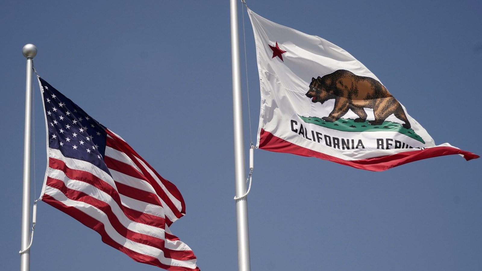 Aug 27, 2020; Inglewood, California, United States; A general overall view of United States and California flags at SoFi Stadium.