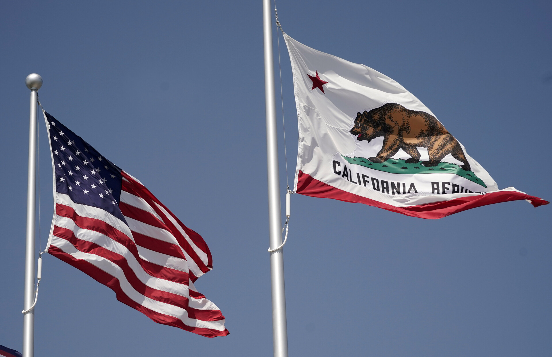 Aug 27, 2020; Inglewood, California, United States; A general overall view of United States and California flags at SoFi Stadium.