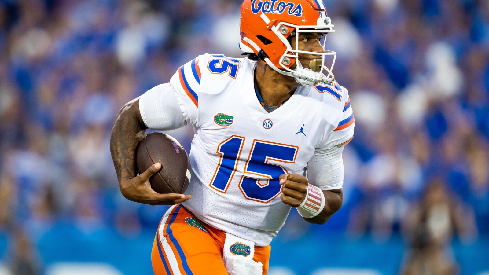 Oct 2, 2021; Lexington, Kentucky, USA; Florida Gators quarterback Anthony Richardson (15) carries the ball down the field during the second quarter against the Kentucky Wildcats at Kroger Field.
