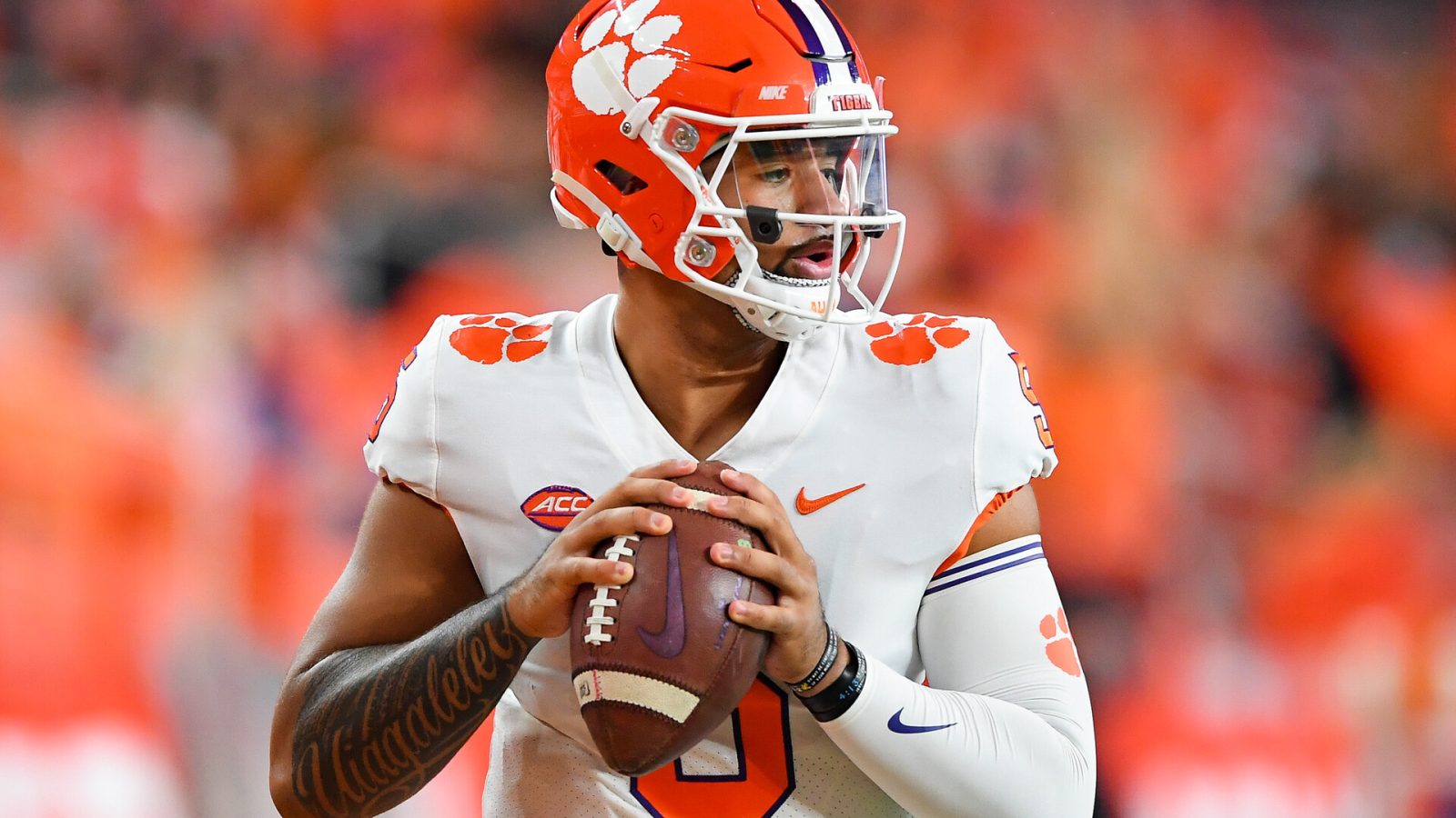 Oct 15, 2021; Syracuse, New York, USA; Clemson Tigers quarterback D.J. Uiagalelei (5) warms up prior to the game against the Syracuse Orange at the Carrier Dome.