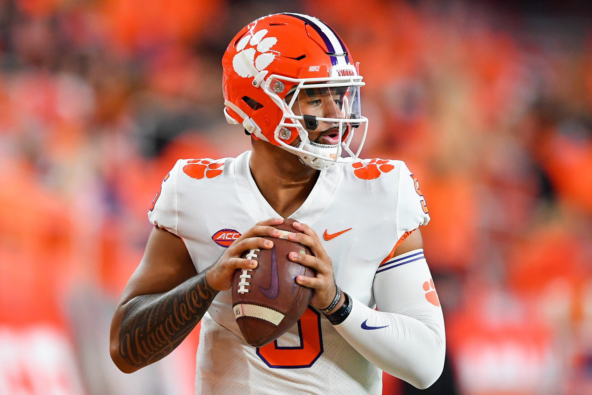 Oct 15, 2021; Syracuse, New York, USA; Clemson Tigers quarterback D.J. Uiagalelei (5) warms up prior to the game against the Syracuse Orange at the Carrier Dome.